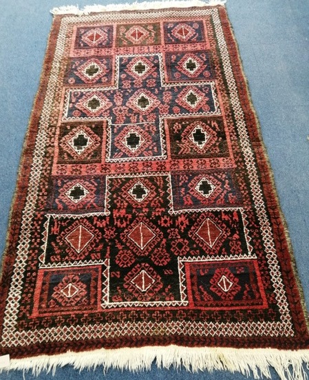 A Belouch rug 205 x 109cm